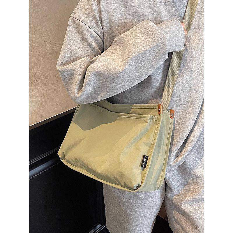 帆布包包女大容量2025简约新款简约百搭单肩斜挎包休闲上课托特包