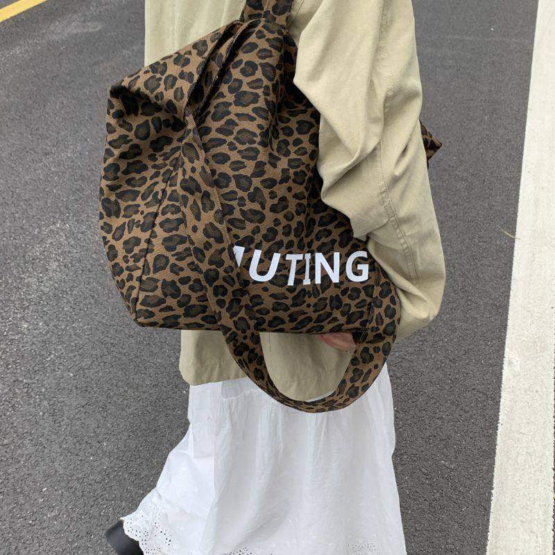 韩系慵懒风百搭高级感豹纹帆布包女2025新款大容量通勤单肩托特包