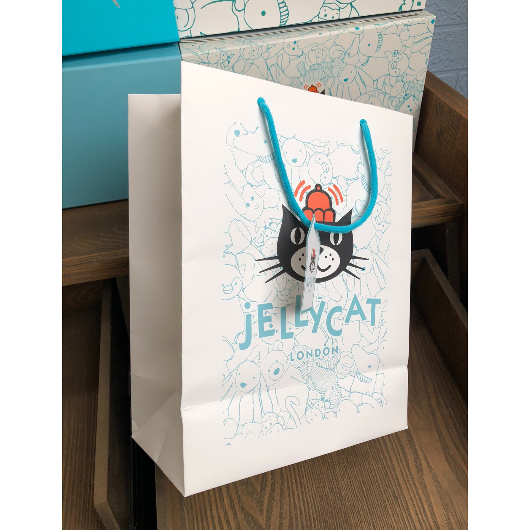 jellycat蓝色满印包装防尘袋手提袋带抽绳手提礼品袋磁吸翻盖礼盒图片