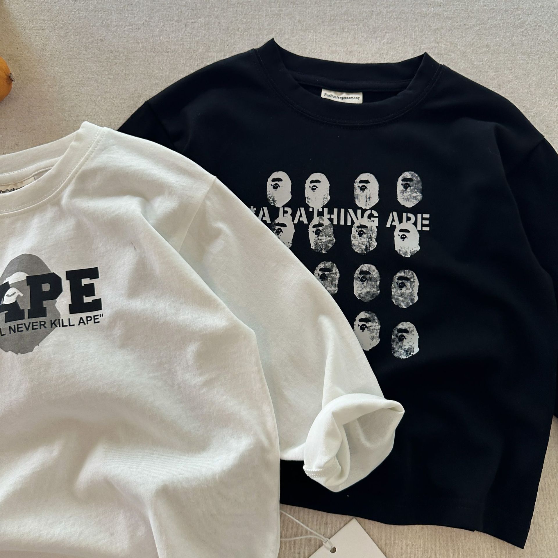 儿童长袖T恤2025秋季新品男女童卡通长袖T宝宝简约打底衫