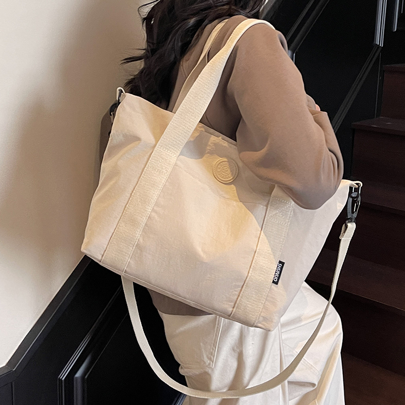 日系休闲大容量帆布包包女2025新款斜挎包轻便布袋学生上课托特包