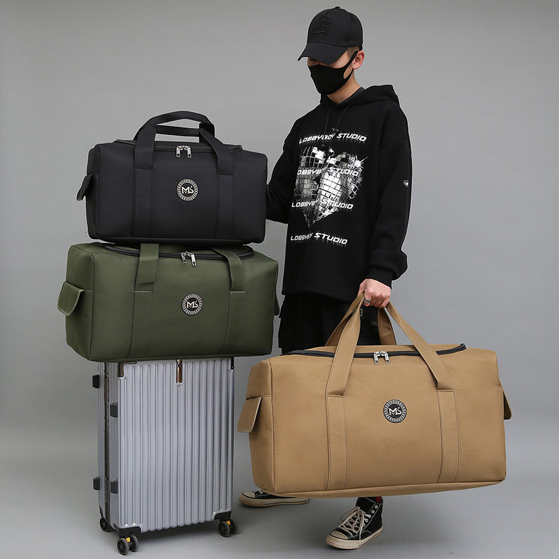 超大容量手提行李袋户外搬家装衣服打工背包布袋旅行包男士旅游包