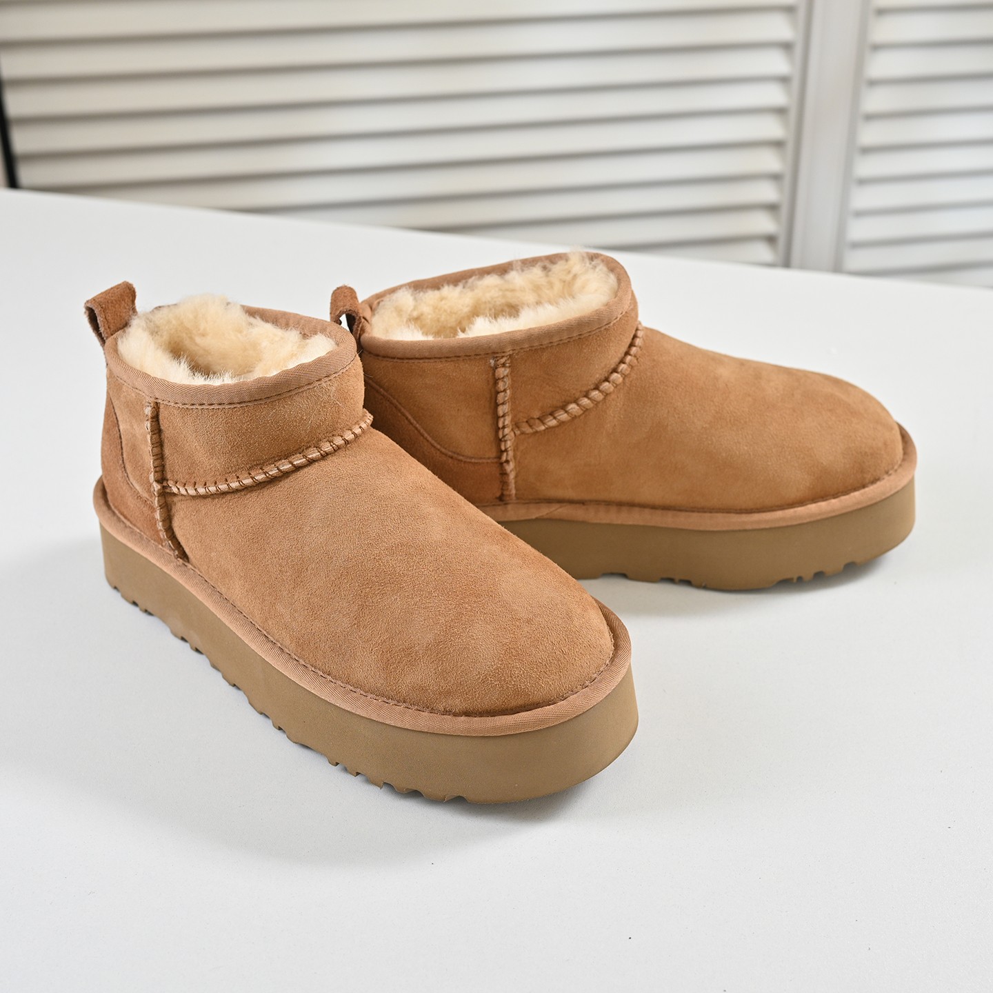 步享栗色羊皮毛一体短筒雪地靴女