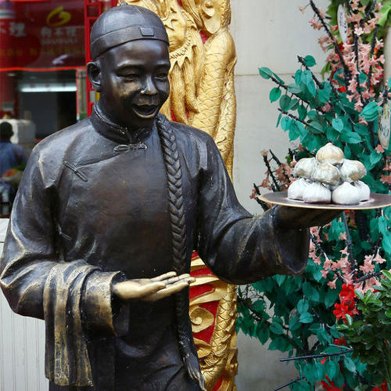 石定制卖小笼包子雕像小二哥迎宾