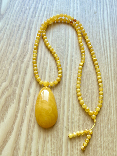 天然俄罗斯老蜜蜡琥珀吊坠鸡油黄水滴项链高档原矿长链正品珠宝