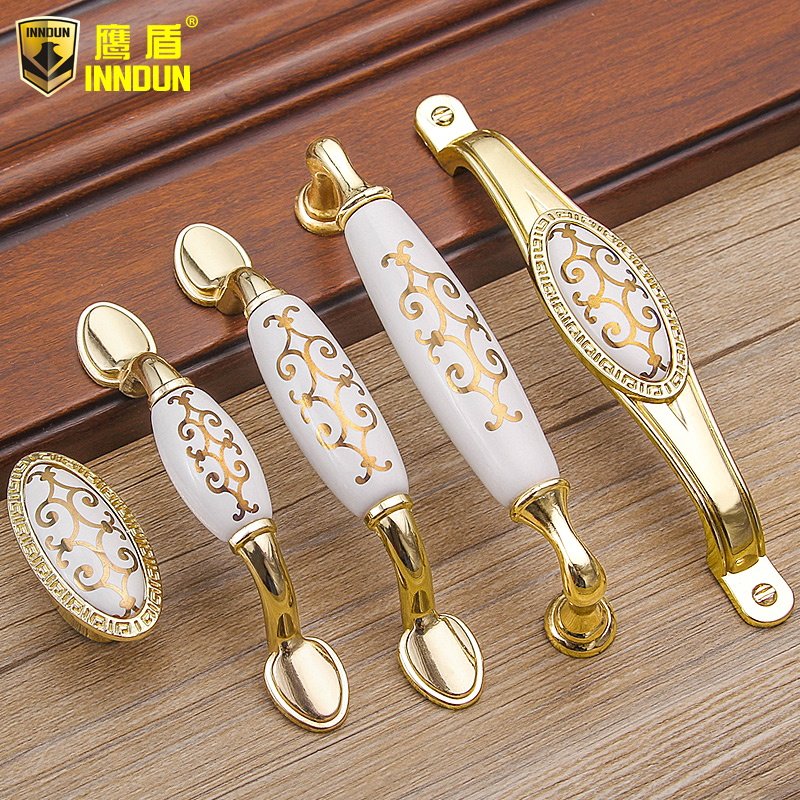鹰盾欧式金色金钩大金花陶瓷拉手新中式仿古田园衣柜橱柜抽屉把手在类目 基础建材, 家用五金, 拉手, 小拉手中 - 来自Buy2taobao.com提供专业的淘宝代购服务
