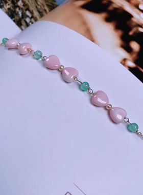 珠宝手链点缀爱心包金女王贝