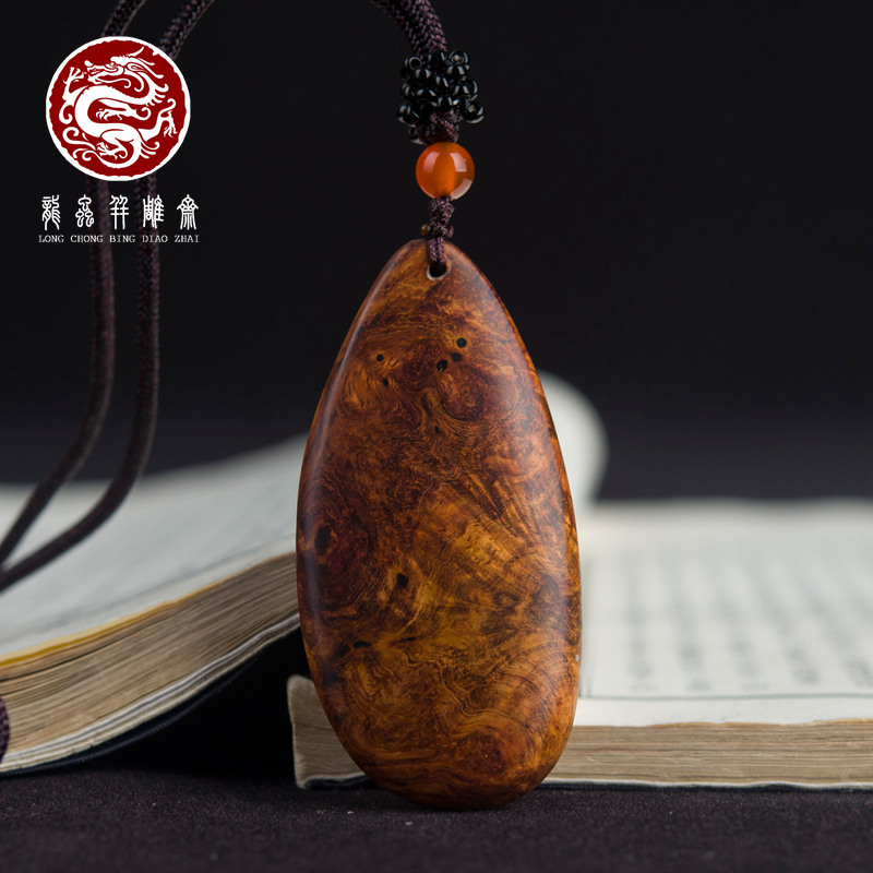 海南黄花梨瘤疤鬼眼鹅蛋形吊坠