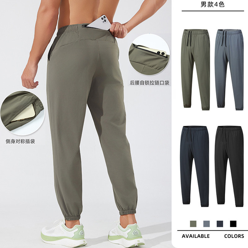 马拉松专业跑步长裤男可放手机宽松运动束脚裤速干高弹力健身裤秋