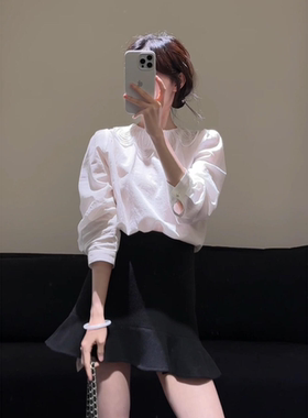 黑色简约高腰设计感木耳半身裙女2026早春新款时髦减龄百搭荷叶裙