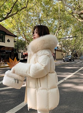 今年流行温柔风大毛领连帽羽绒服女2025新款冬季奶黄白鸭绒外套冬