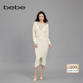 bebe春夏女士绵羊毛流苏仿钻链水滴洞针织半身裙130801