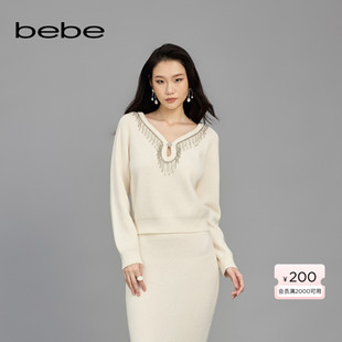 bebe2025春季 水滴洞V领针织上衣130506 女士绵羊毛流苏仿钻链长袖
