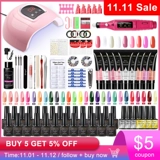 Набор ногтей с ногтевой лампой.