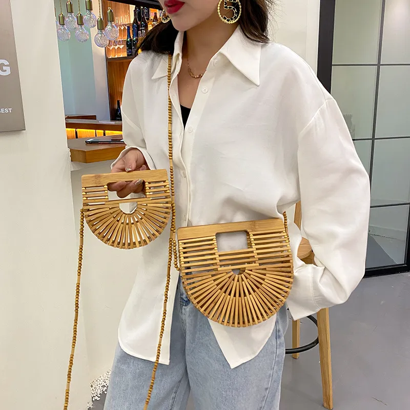 网红ins镂空编织女包2025春新款潮时尚斜挎包竹编半圆手提沙滩包
