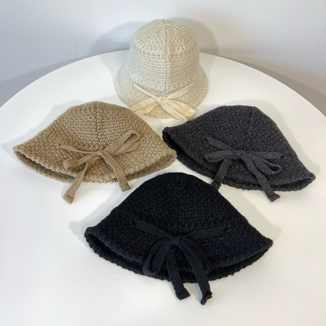 韩版ins羊毛混纺渔夫帽韩国代购秋冬蝴蝶结时尚甜美麻花纹毛线帽