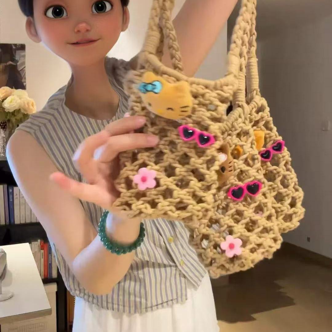 夏威夷kt猫咪手工编织镂空斜挎包女夏日度假出门遛弯卡通手机包
