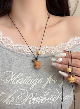 卡通简约黑绳黄色小星星吊坠项链女精致干果串珠颈链设计感毛衣链