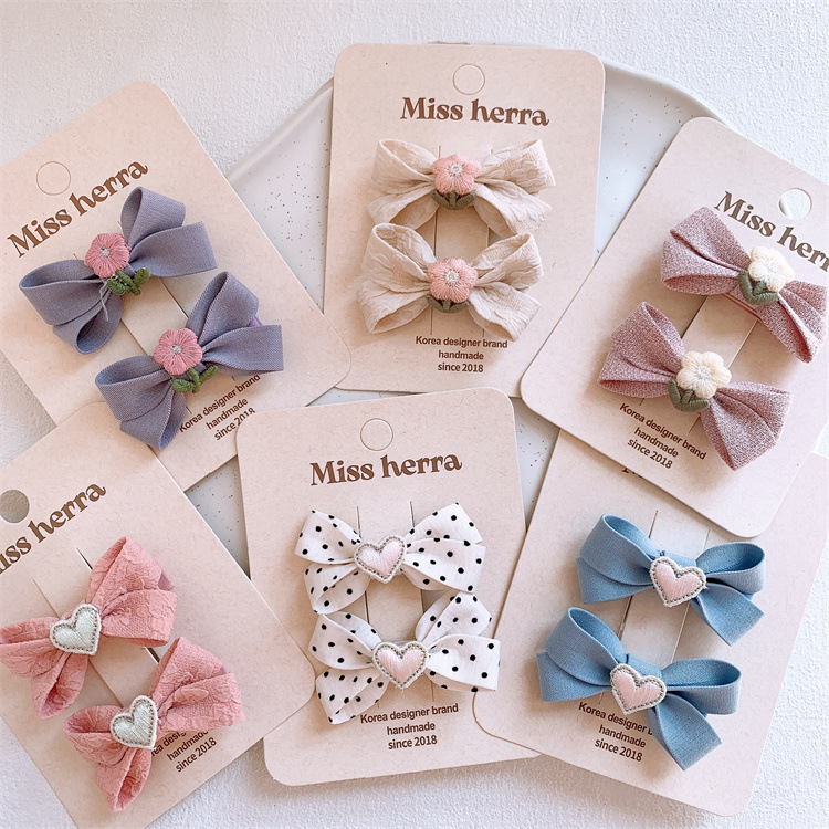 新款儿童爱心花朵布艺蝴蝶结发夹甜美女童侧边刘海夹对装发卡边夹