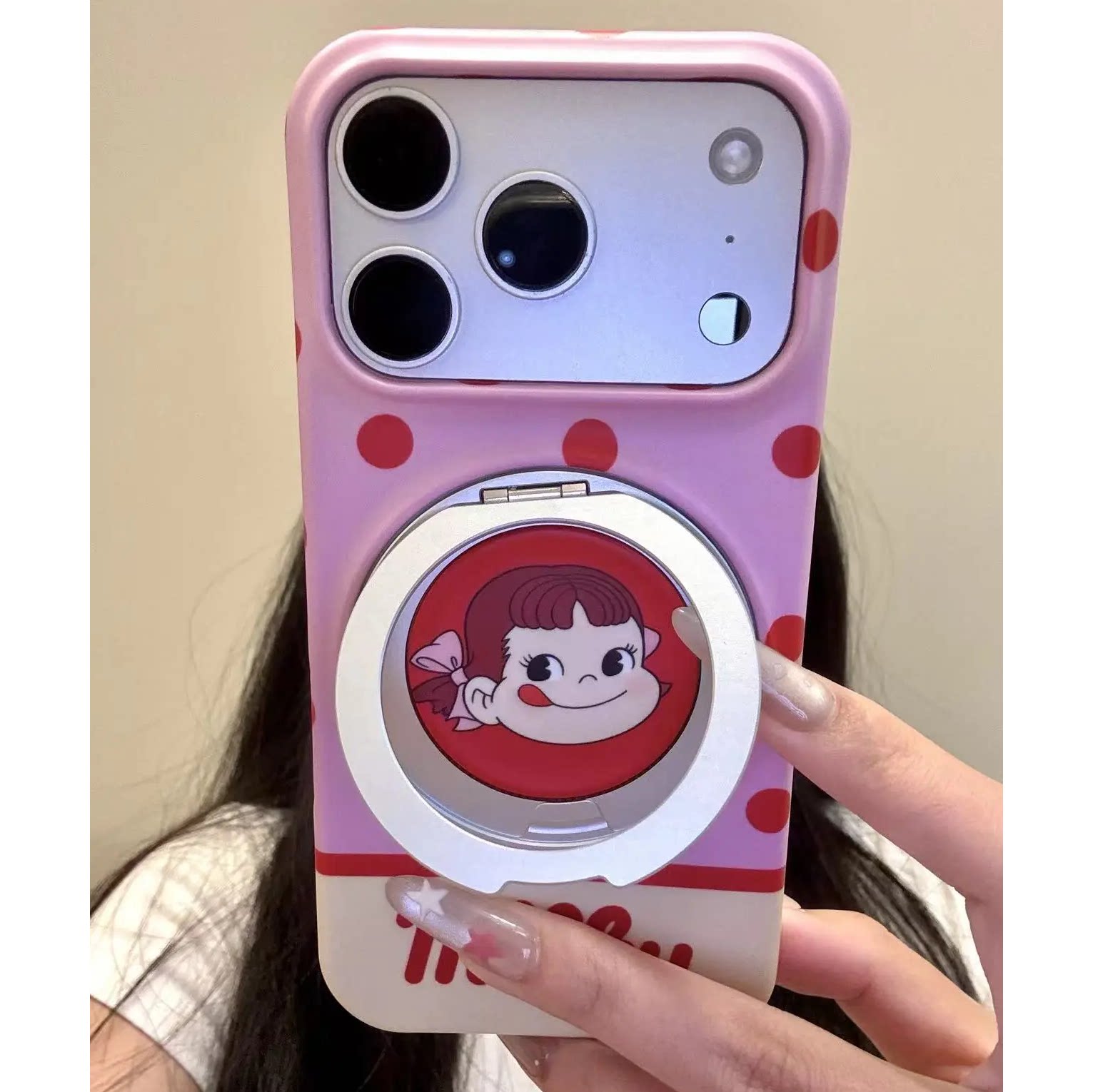 卡通波点奶糖女孩旋转支点手机壳图片