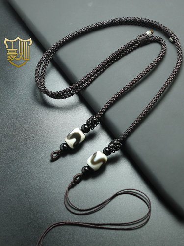 西藏天珠横穿虎牙挂绳长节蜜蜡