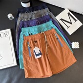 奥特莱斯 清仓外贸户外山系情侣松紧腰防水速干沙滩运动休闲短裤