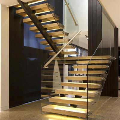 复式二楼楼梯定制室内家用钢木阁楼旋转网红灯带踏步感应玻璃护栏