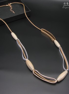 春夏长项链时尚个性镂空木珠皮绳轻奢气质百搭毛衣链衣服配饰挂件