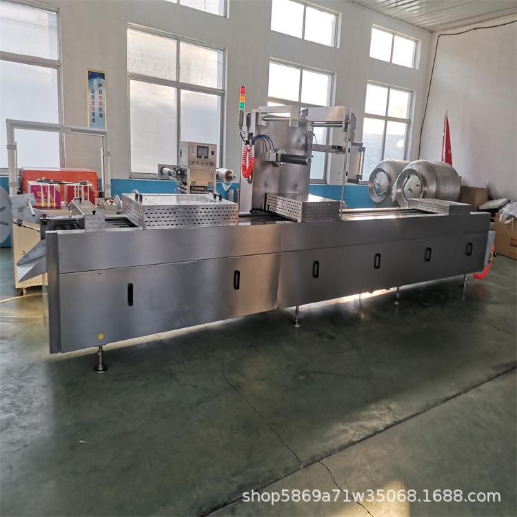 商用拉伸膜真空包装机奶酪连续式真空包装设备小型全自动拉伸机