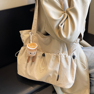 通勤包可放水杯学生上课帆布包女上学手提袋松弛感包包女款大容量