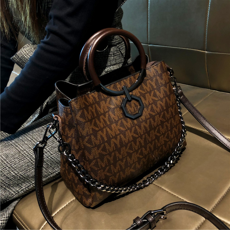 香港品牌质感单肩包休闲水桶包女