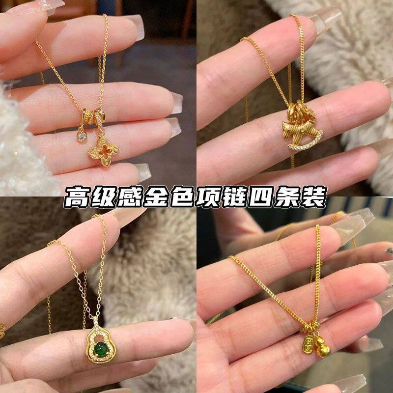 金色精致镂空锆石小众吊坠项链设计高级感气质百搭秋冬配饰毛衣