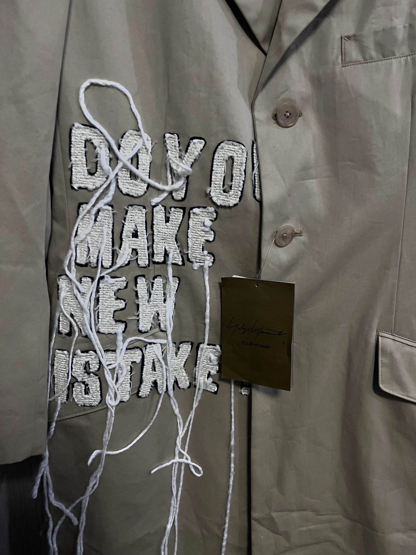 Yohji Yamamoto Beige Slogan Fringe Coat — detail