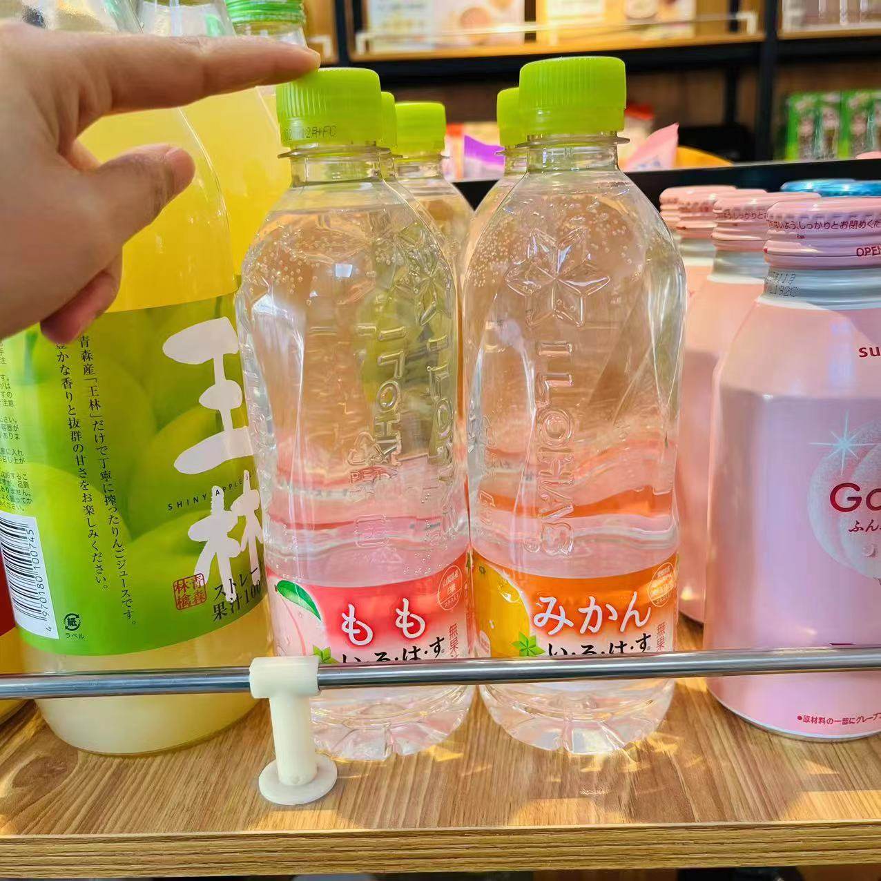 日本可口可乐饮料天然透明水白桃橙子味水555ml*24瓶整箱风味饮料