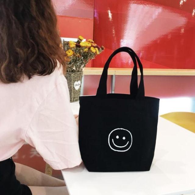 帆布包迷你笑脸帆布袋便当包手提简约环保书袋百搭可爱休闲校园|msdalam kategori Beg kulit/wanita/beg lelaki, beg Ms. - dari Buy2taobao.com untuk memberikan perkhidmatan ejen Taobao profesional membeli
