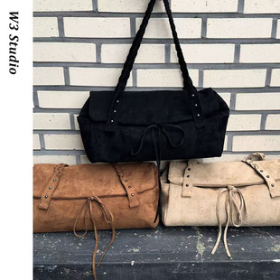 韩国小众deinet麂皮蝴蝶结麻花编织单肩斜挎包通勤大容量腋下包女