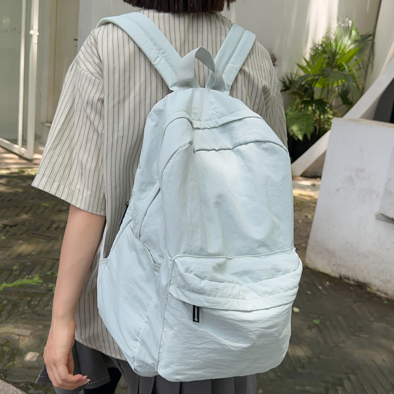 ins慵懒风轻便双肩包女纯色书包女生高中大学生旅游防水速干背包