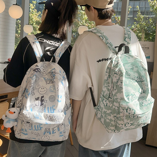 轻便型印花书包男女款大学生大容量双肩包潮流帅气防水旅游背包男
