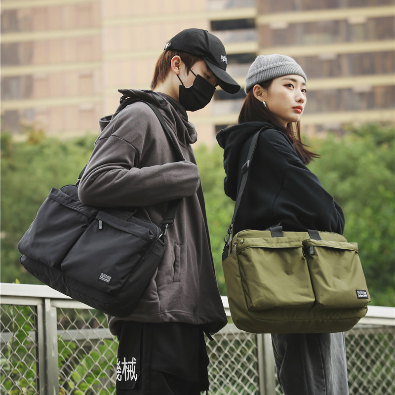 休闲工装包妮迪珈电脑单肩包时尚