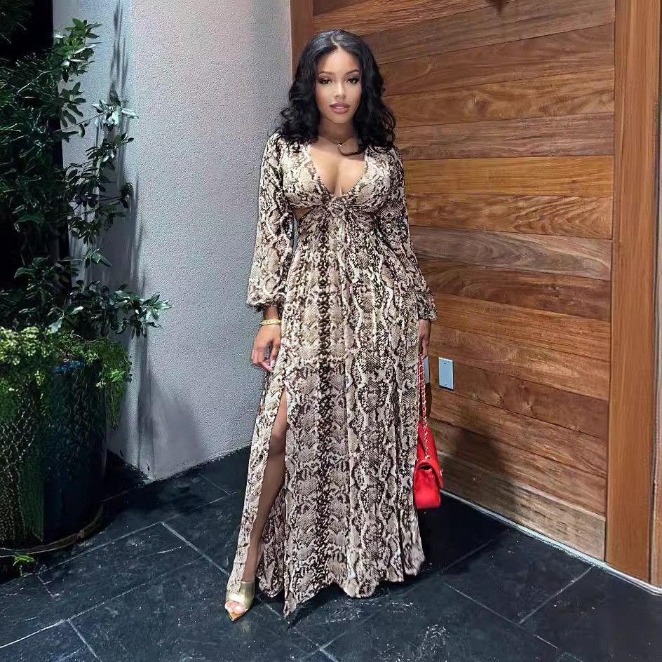 秋季新款欧美女装时尚性感镂空飘逸沙滩连衣裙蟒蛇纹开叉长裙
