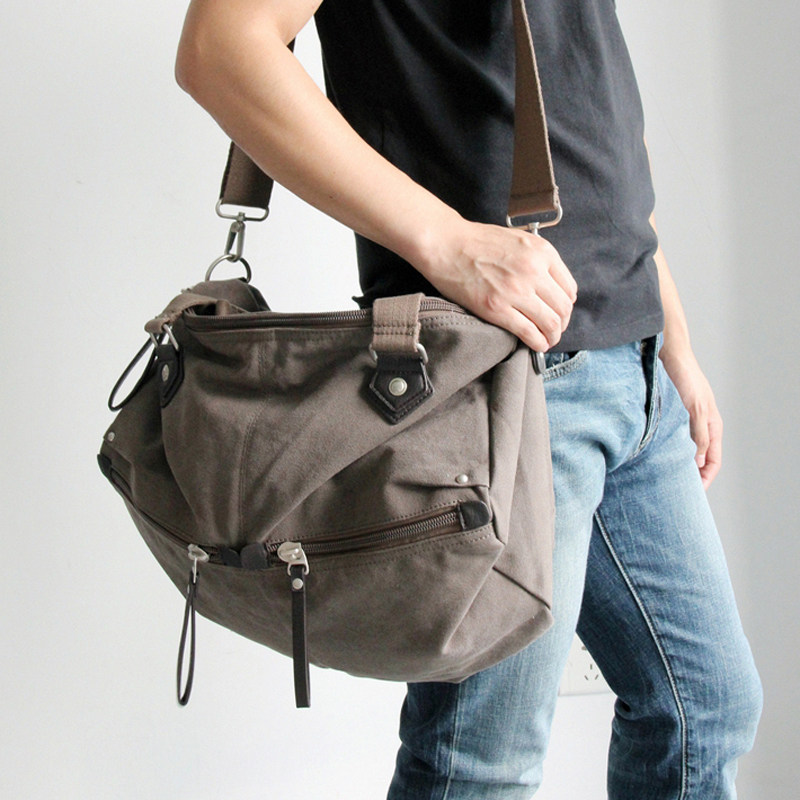 韩版正品休闲男包斜挎手提包单肩旅行背包学生文艺简约风帆布包包