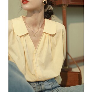 秋季泡泡袖衬衫女2026年新款设计感小众鹅黄衬衣法式宽松别致上衣