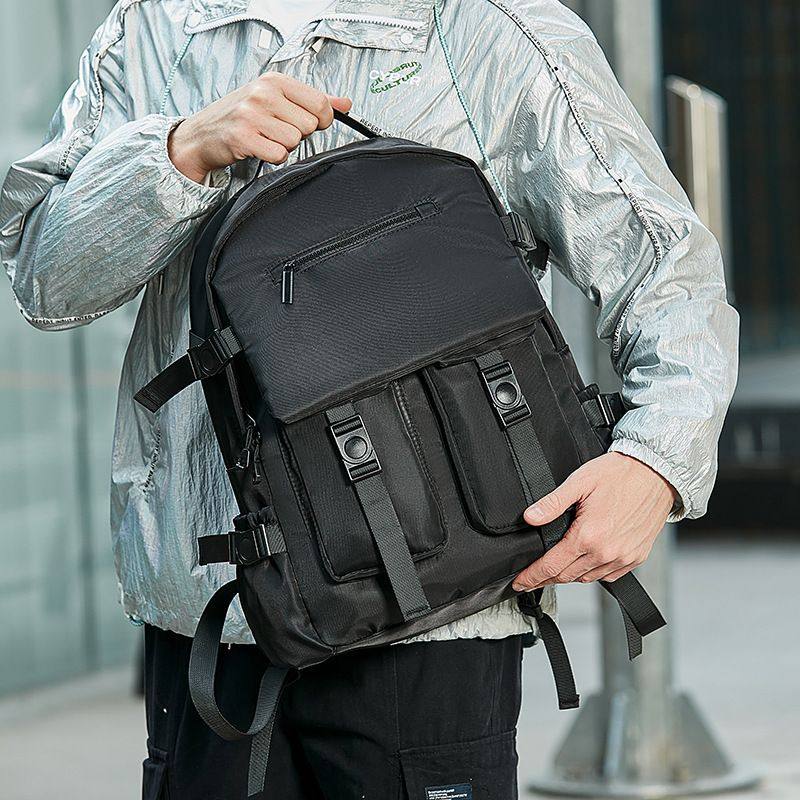 纯色双肩包男士休闲防水旅行包电