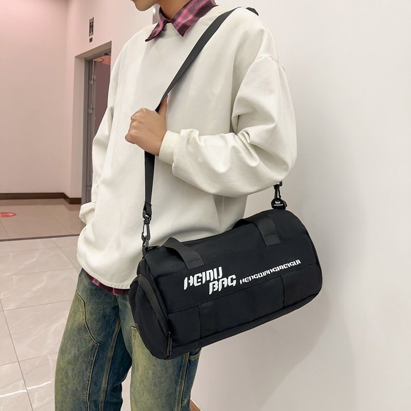 旅行包新款男女大容量行李袋潮时尚轻便手提健身包户外运动收纳包