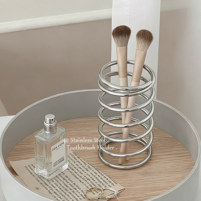 不锈钢牙刷架简约桌面浴室台面化妆刷收纳筒创意弹簧卫生间牙刷座