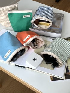 MomentFuture帆布手拿小包收纳袋化妆包小众纯色格子百搭韩ins风