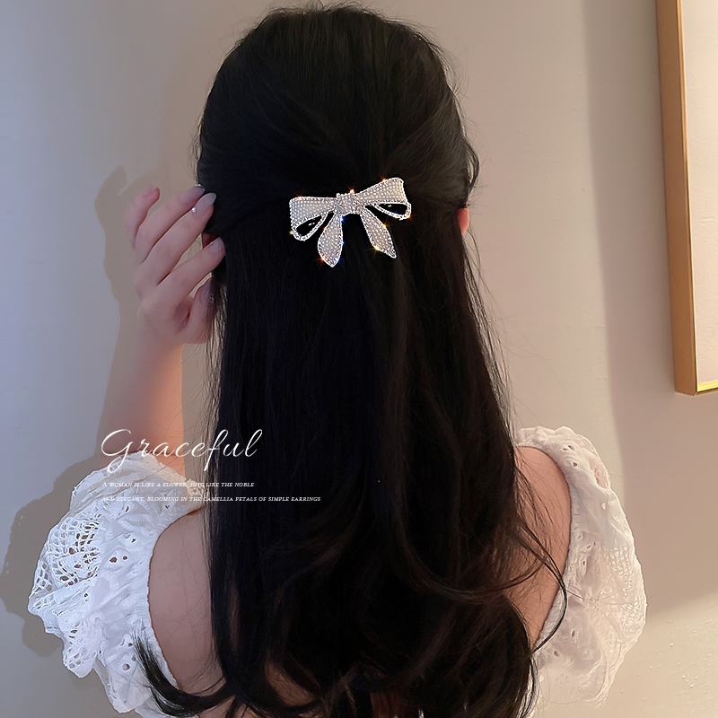 珍珠蝴蝶结弹簧夹半扎发夹