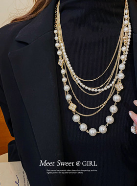 多层叠戴珍珠串珠项链
