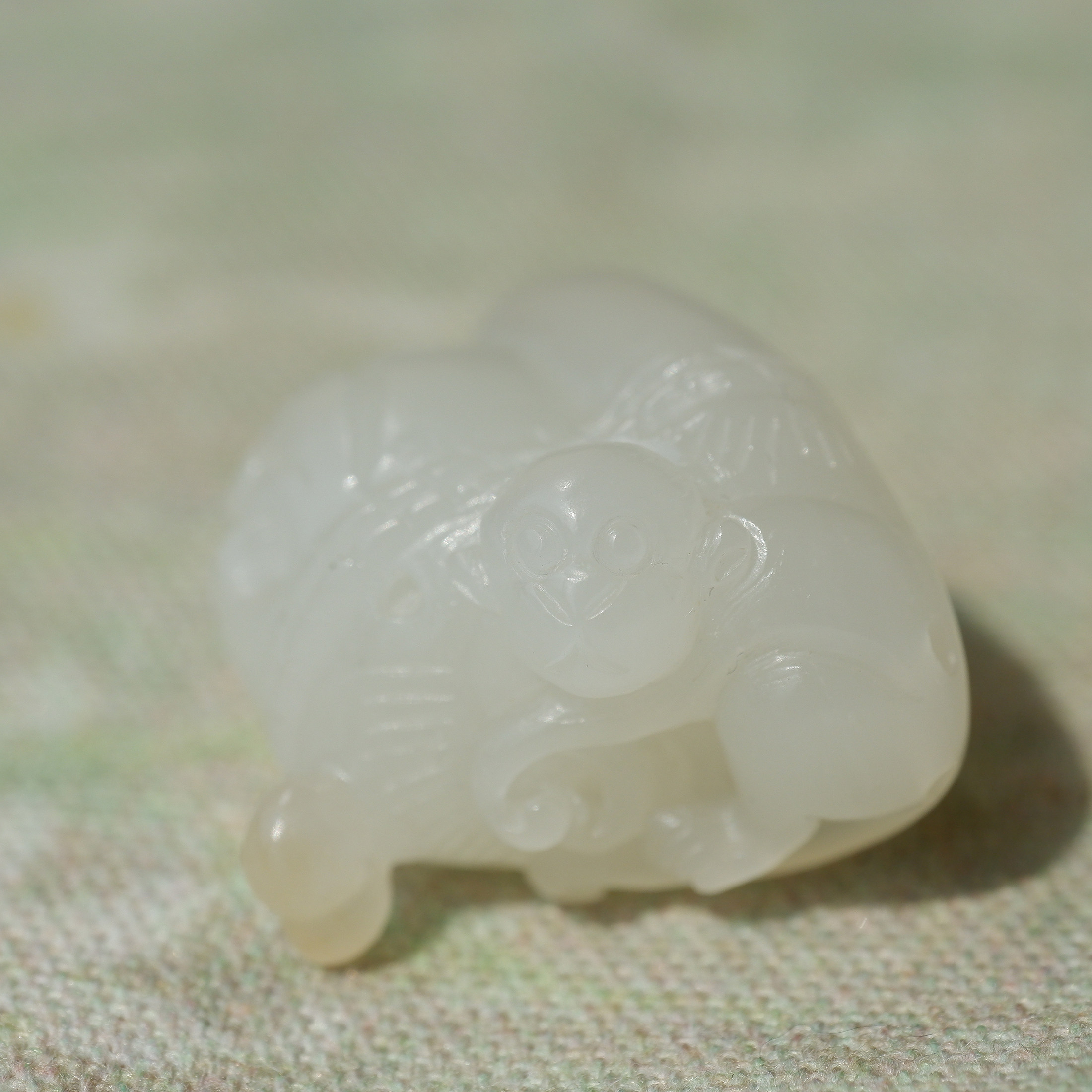 王实斋珠宝新疆和田玉糖白玉猴子