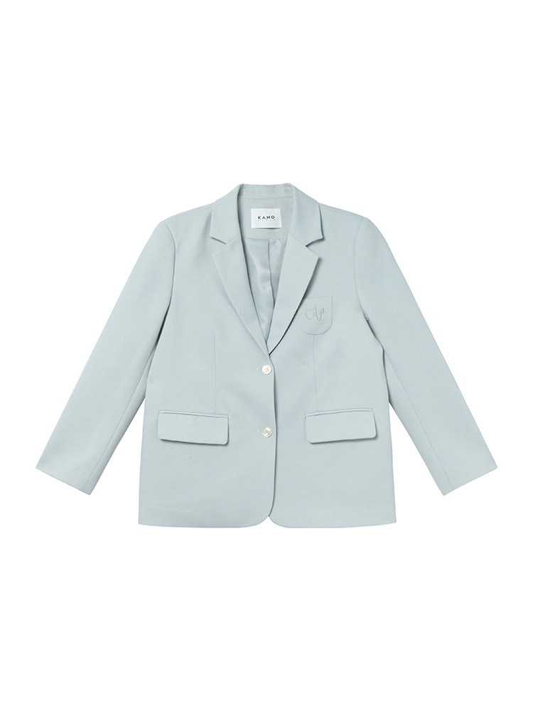 Light blue blazer jacket laid flat on a white background